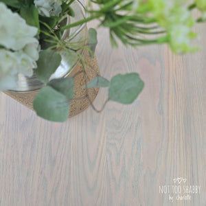 Close up of pine coffee table refinished in Fusion Mineral Paint Taupe Stain and Finishing Oil