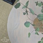 Load image into Gallery viewer, Close up of top of large chunky pine coffee table for sale, with base painted in Coal Black and top refinished in Taupe Stain and Finishing Oil 
