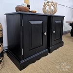 Load image into Gallery viewer, Side view of a pair of Coal Black painted pine cupboards with silver knobs and hinges
