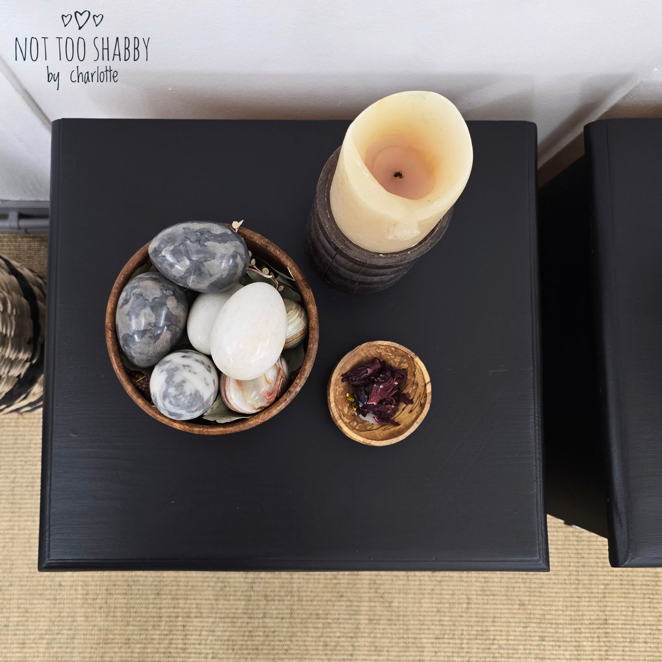 Vertical view of a pair of Coal Black painted pine cupboards with silver knobs and hinges