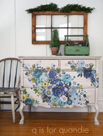 Load image into Gallery viewer, Cosmic Roses Extra Large Redesign with Prima Transfer - blue, turquoise and cream flowers with gold writing on a vintage white chest of drawers
