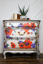 Load image into Gallery viewer, Modernist Floral Extra Large Redesign with Prima Transfer from the Cece Collection, bold abrast floral shapes in bright red, white and purple on a white chest of drawers

