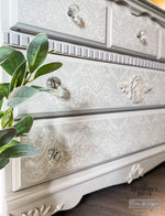 Load image into Gallery viewer, Elegant Lace Redesign with Prima Border Stencil in white over pale grey drawers
