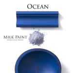 Load image into Gallery viewer, Homestead House Milk Paint Ocean Blue Flat Lay with powder, painted trim and chippy bowl
