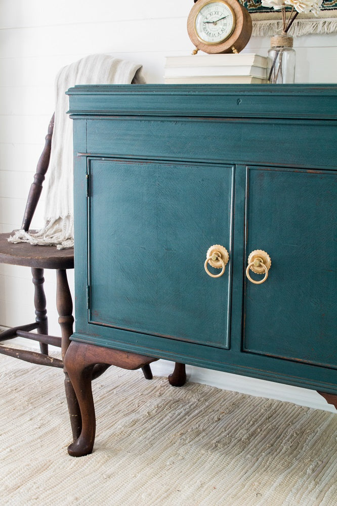 Homestead House Milk Paint Gaspe with gold handles and walnut legs