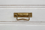 Load image into Gallery viewer, Homestead House Milk Paint Sturbridge White distressed drawer with vintage brass handled close up
