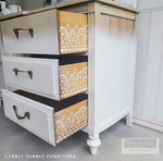 Load image into Gallery viewer, Mendhi Border Redesign with Prima Resusable Adhesive Stencil from the Cece Restyled Collection on the side of drawers
