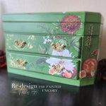 Load image into Gallery viewer, Seasonal Splendor Redesign with Prima Middy Transfer - rusts and autumnal shades, flowers, leaves and berries on a leaf green chest of drawers
