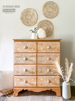 Load image into Gallery viewer, Eastern Abstract Redesign with Prima Stencil, intricate morrocan tile pattern stenciled in white on wood drawers

