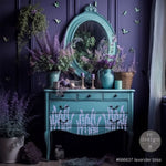 Load image into Gallery viewer, Lavender Bliss Redesign with Prima Stencil in lilac on a teal dressing table
