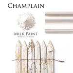 Load image into Gallery viewer, Homestead House Milk Paint Champlain Flat Lay with powder, painted trim and distressed aged paintwork picket fence
