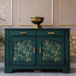 Load image into Gallery viewer, A BirdSong Gold Foil Transfer - by Kacha for Redesign with Prima applied to a deep green sideboard with black wax
