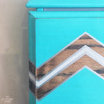 Load image into Gallery viewer, Aqua, dark wood and silver taped chevron design on bureau front
