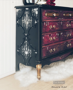 Load image into Gallery viewer, Glam Punk Redesign with Prima 5 piece stencil set, including tattoo swallows, frame, Chandelier, heart with wings and skull on the side of a gothic black sideboard
