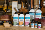Load image into Gallery viewer, Range of Clear Polyvine Interior and Exterior Decorator's Varnish in Dead Flat, Satin and Gloss on a workshop bench
