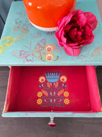 Load image into Gallery viewer, Floral Polish Redesign with Prima Transfer in bright pink, yellow, orange, blue and green folk art floral patterns inside a drawer
