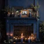Load image into Gallery viewer, Quiet Country Blue Redesign with Prima Christmas Middy Transfer in picture frames above candles and a dark blue winter fireplace
