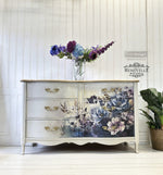 Load image into Gallery viewer, Serene Shadows Redesign with Prima Fibre Decoupage Paper on a cream chest of drawers with gold handles
