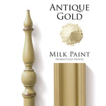 Load image into Gallery viewer, Homestead House Milk Paint Antique Gold Flat Lay with powder, painted trim and distressed spindle
