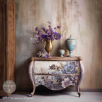 Load image into Gallery viewer, Serene Shadows Redesign with Prima Fibre Decoupage Paper on a vintage bombe chest of drawers with gold handles
