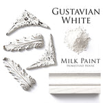 Load image into Gallery viewer, Homestead House Milk Paint Gustavian White Flat Lay with powder, painted trim and distressed mouldings
