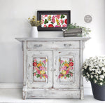 Load image into Gallery viewer, Sunny Glow Redesign with Prima Middy Transfer - bright yellow, pink and orange flowers on a vintage distressed white sideboard
