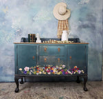 Load image into Gallery viewer, Pressed Flowers Redesign with Prima Extra Large Transfer across the bottom of a moody blended green sideboard
