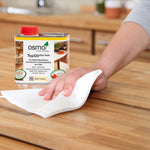 Load image into Gallery viewer, Osmo Top Oil, available in 7 colours, available in 3 sizes - being applied to solid wooden cabinets
