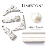 Load image into Gallery viewer, Homestead House Milk Paint Limestone Flat Lay with powder, painted trim and distressed mouldings
