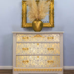 Load image into Gallery viewer, Decadent chest of drawers with gold leaf applied
